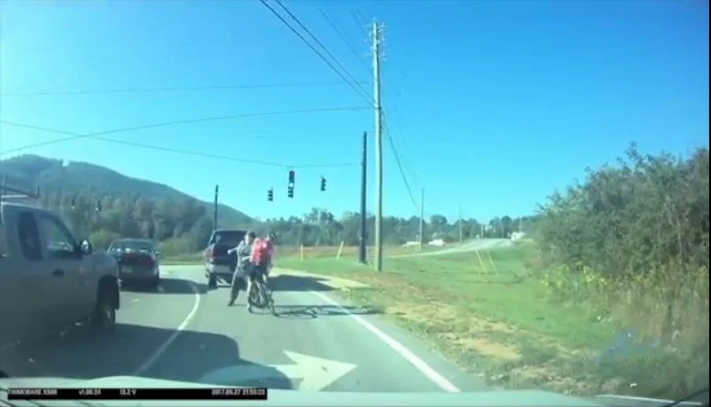 Cyclist punched in face at red light in Asheville, NC