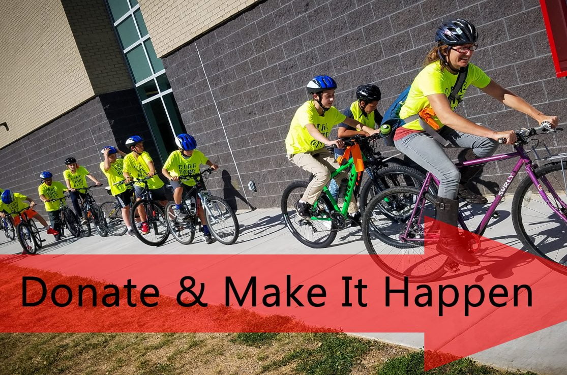 Image of After School Bike Club riding in yellow shirts