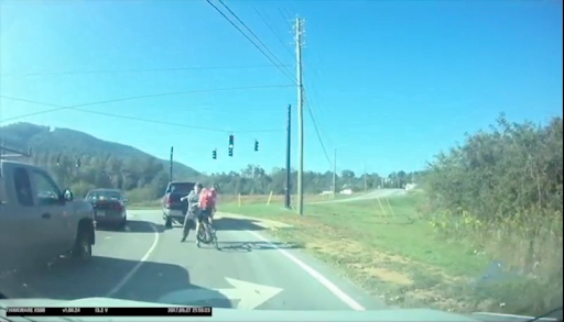 Dash camera footage screenshot of 2017 bicycle harassment incident 