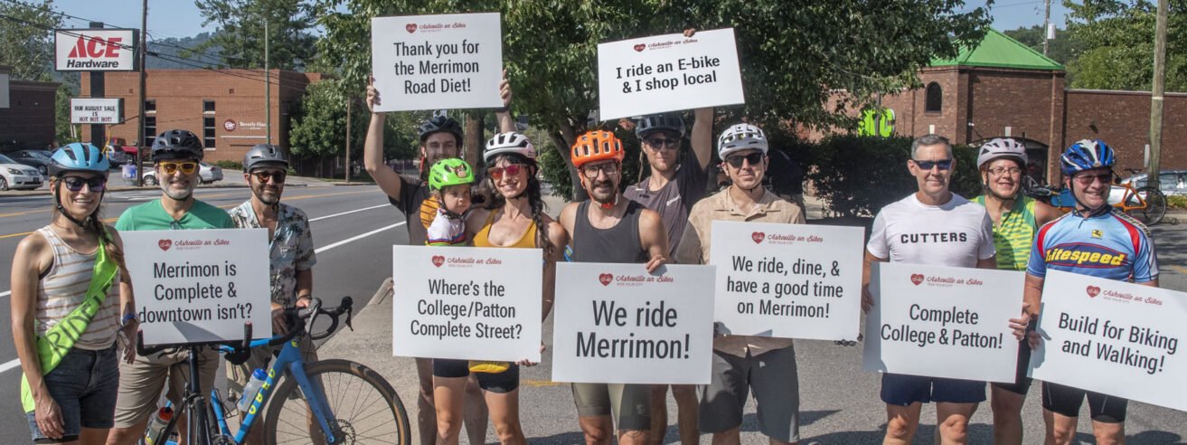 Bike riders celebrate Merrimon bike lane from Merrimon Road Diet project