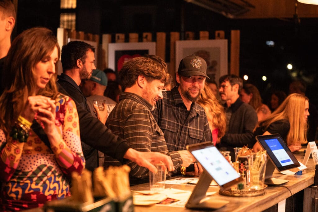 People gathered at bar at Bike Love in Asheville