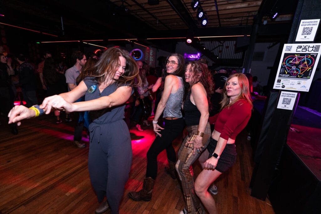 People dancing at Bike Love in Asheville