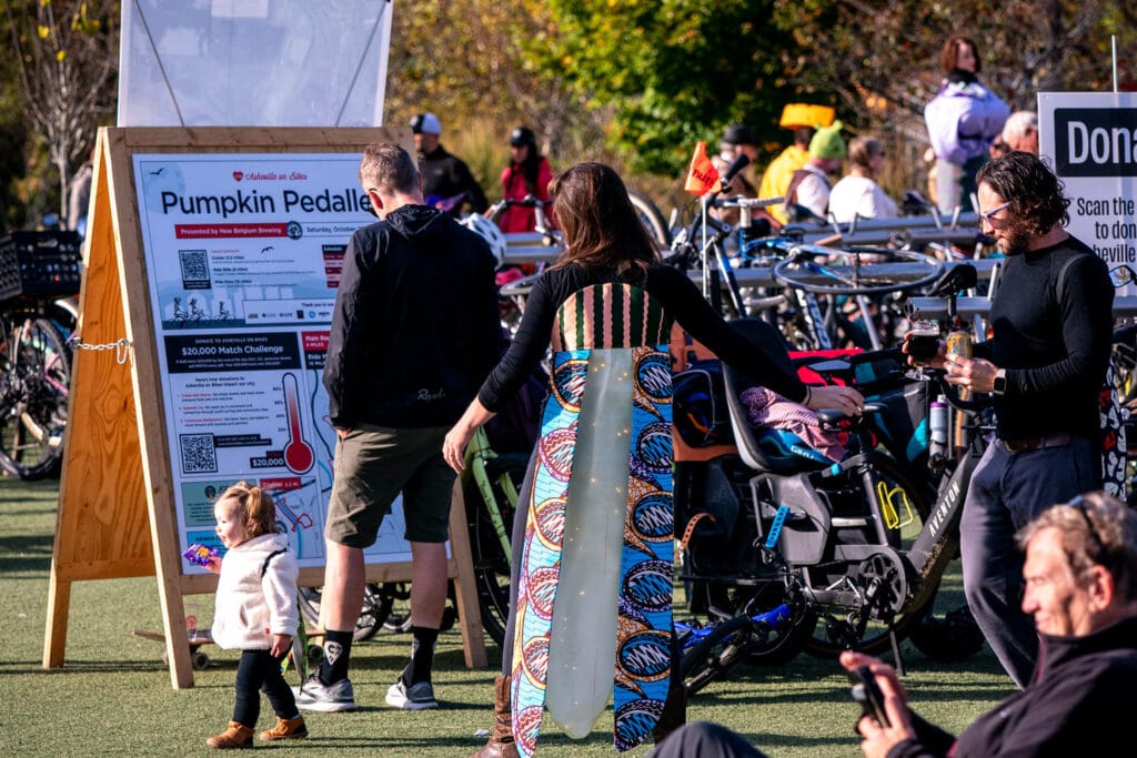 Attendees at Pumpkin Pedaller Community Ride 2025 in Asheville
