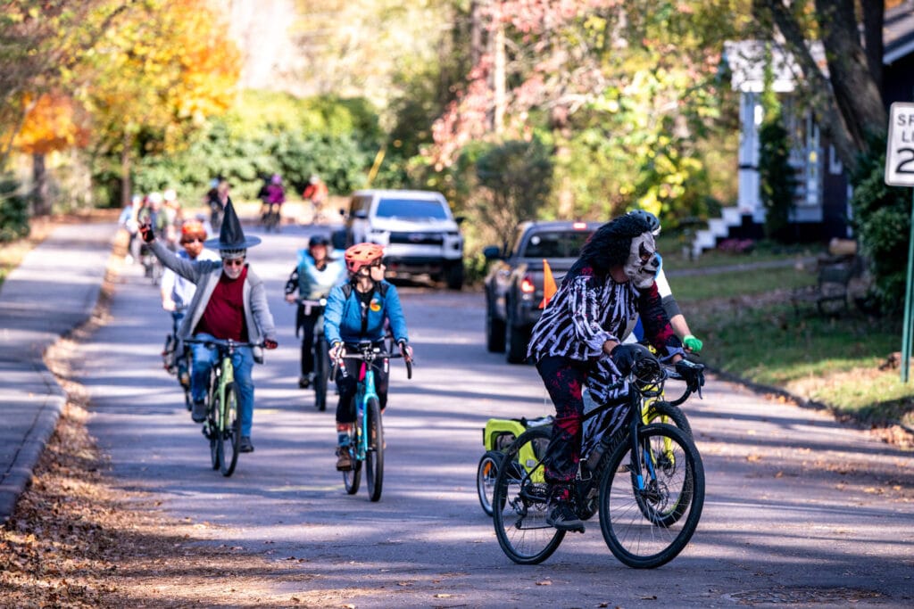 Bike riders at Pumpkin Pedaller Community Ride 2025 in Asheville