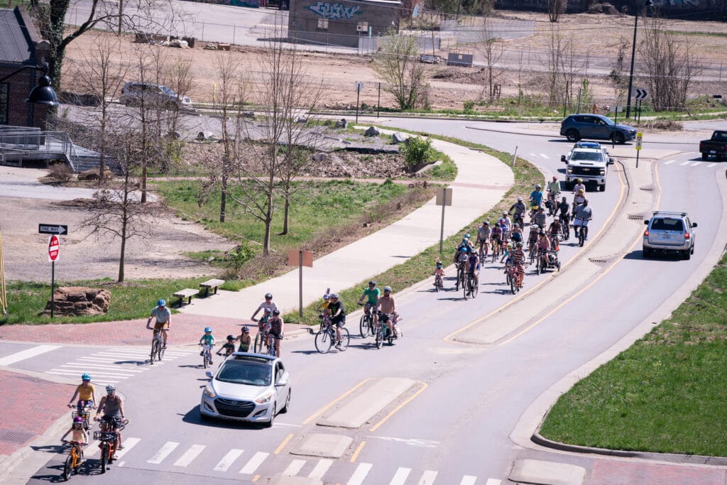 Bike riders on Asheville roads at Spring Out 2025